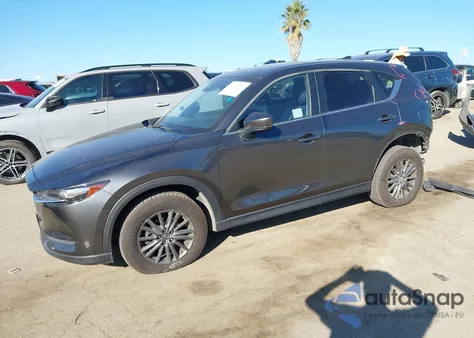 2020 Mazda Cx-5 Touring z USA, uszkodzony, nr VIN JM3KFACM5L0800140